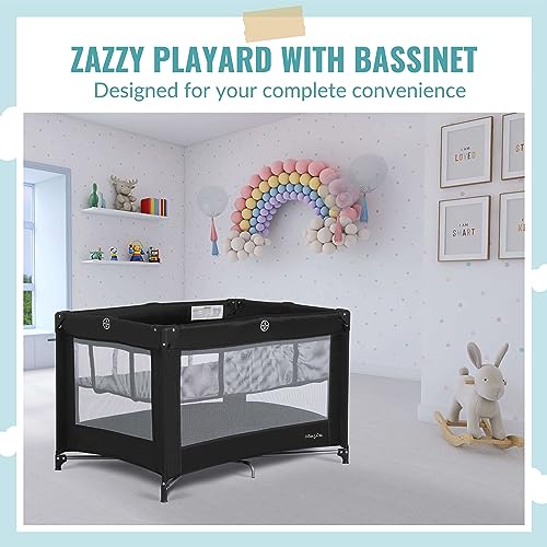 Zazzy Portable Playard with Bassinet in Black, Lightweight Packable and Easy Setup Baby Playard with Mattress and Travel Bag